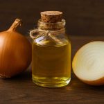 onion-and-onion-oil-on-a-wooden-background